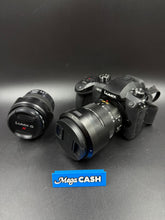 Panasonic Lumix DC-GH5 Camera with 2x Lens, 2x batteries, charger and bag.