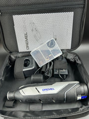 Dremel 824 with charger, 12v battery and small accessories box