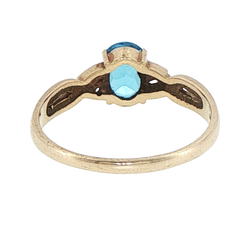 9ct Yellow Gold Oval Blue Topaz Twisted Band Ring