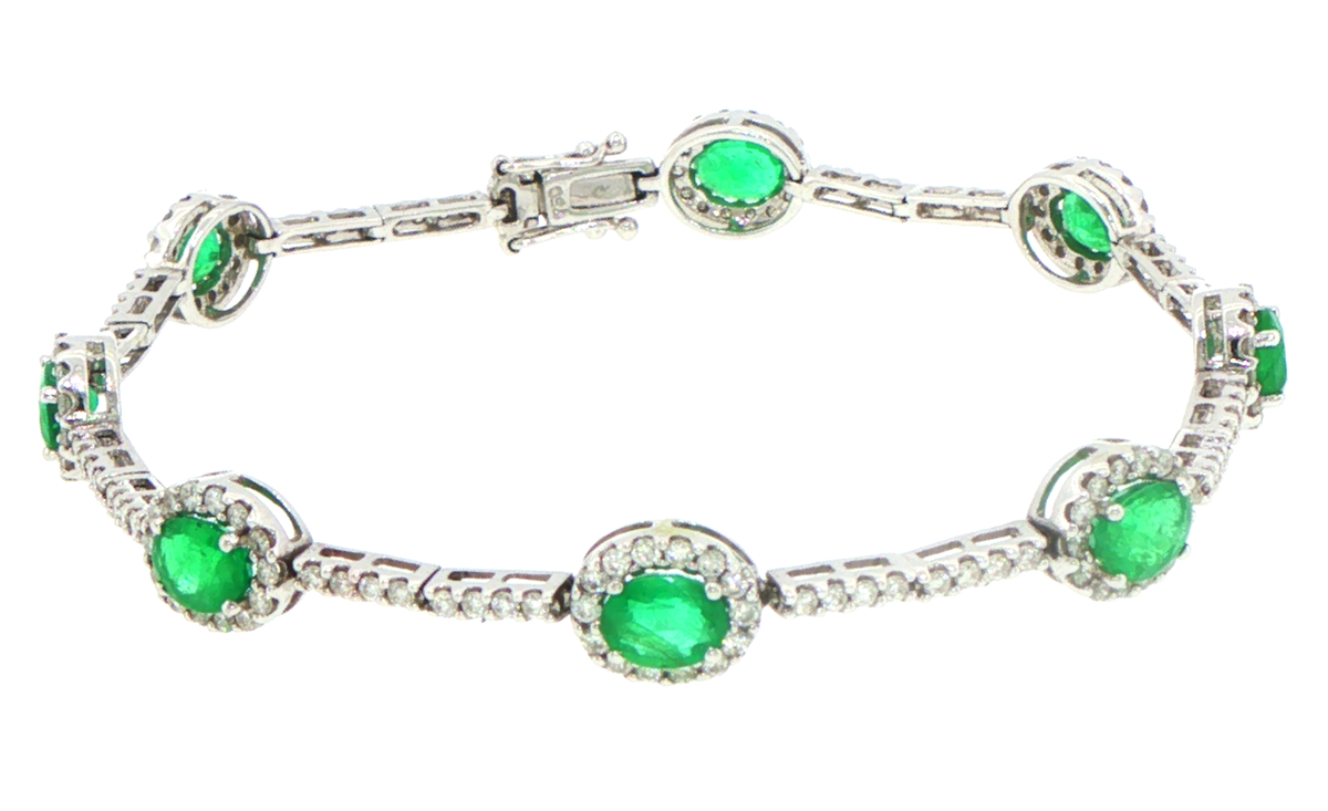 18ct White Gold Emerald and Diamond Halo Chain Bracelet - Valued at $14,175!
