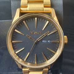 MENS - NIXON - ANALOGUE WATCH - THE SENTRY SS - GOLD METAL BAND - NEVER BE LATE - IN BOX W/ SPRARE LINKS