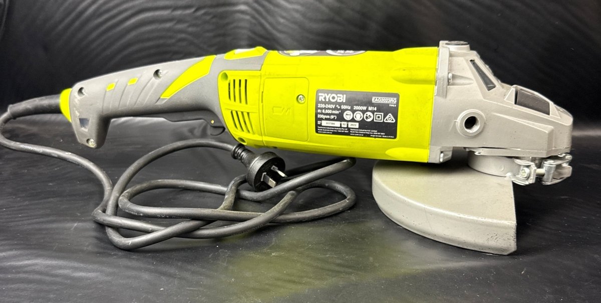 Ryobi 2000W 230mm Corded Angle Grinder EAG2023 in hard case with accessories. - Mega Cash Sydney