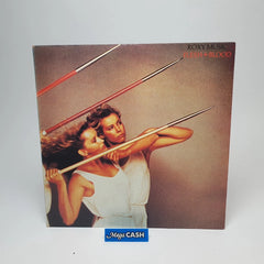 ROXY MUSIC - "Flesh + Blood" - LP RECORD - EG 2311 018